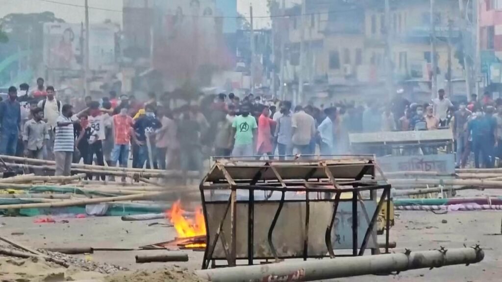 In this image made from a video, supporters of the ousted Prime Minister Sheikh Hasina clash with the police in Gopalganj, Bangladesh, on Wednesday, July 16, 2025. | Photo Credit: AP